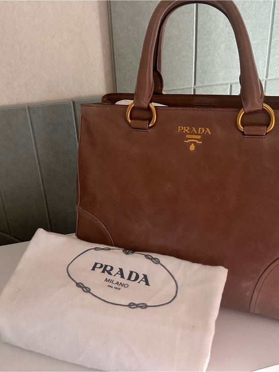 Prada Handbags - Prada taupe leather tote with gold hardware